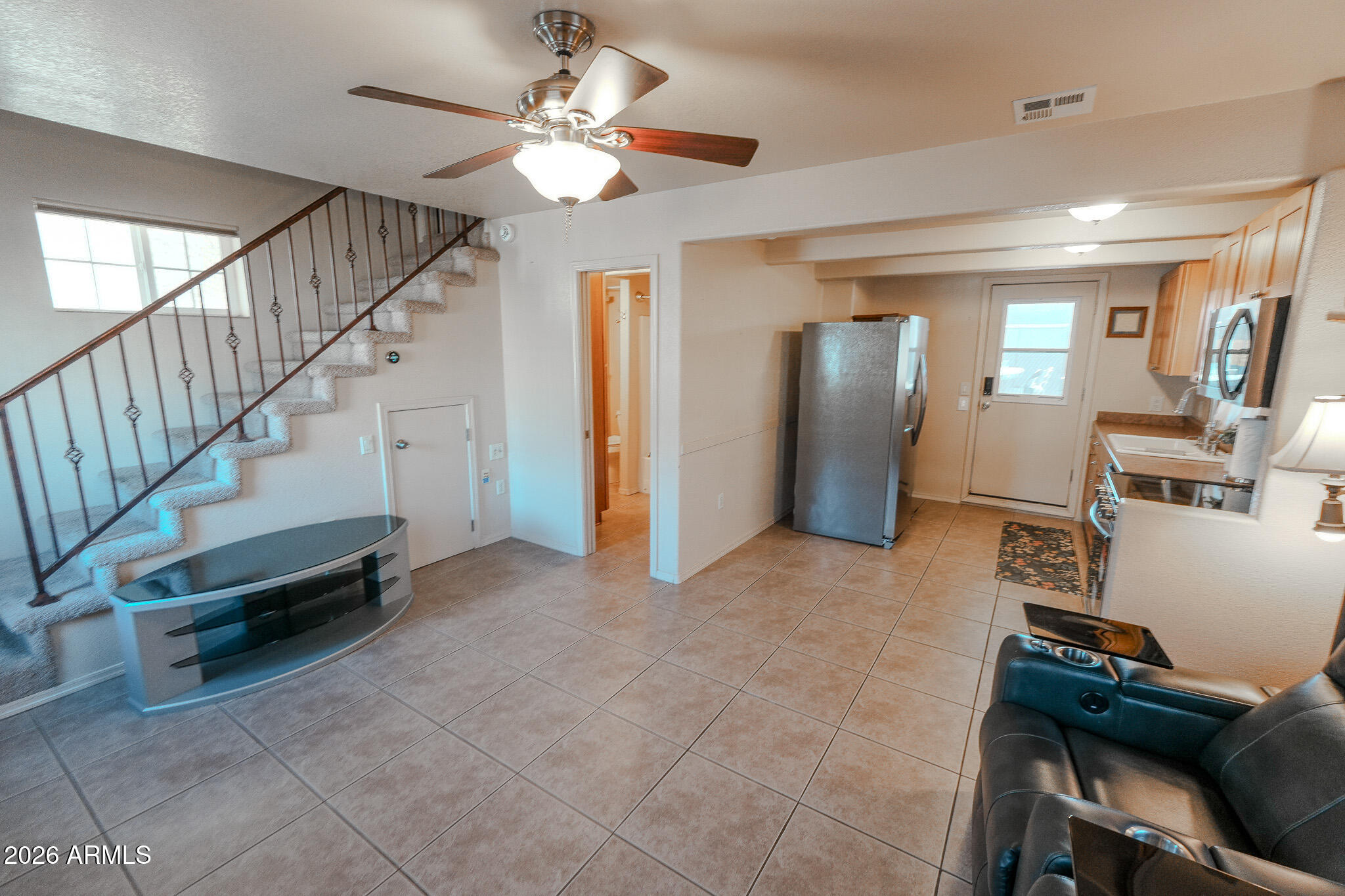 17200 West Bell Road, Unit 1806 Surprise, AZ 85374 - Photo 14 of 23 a view of livingroom with hardwood floor and workspace