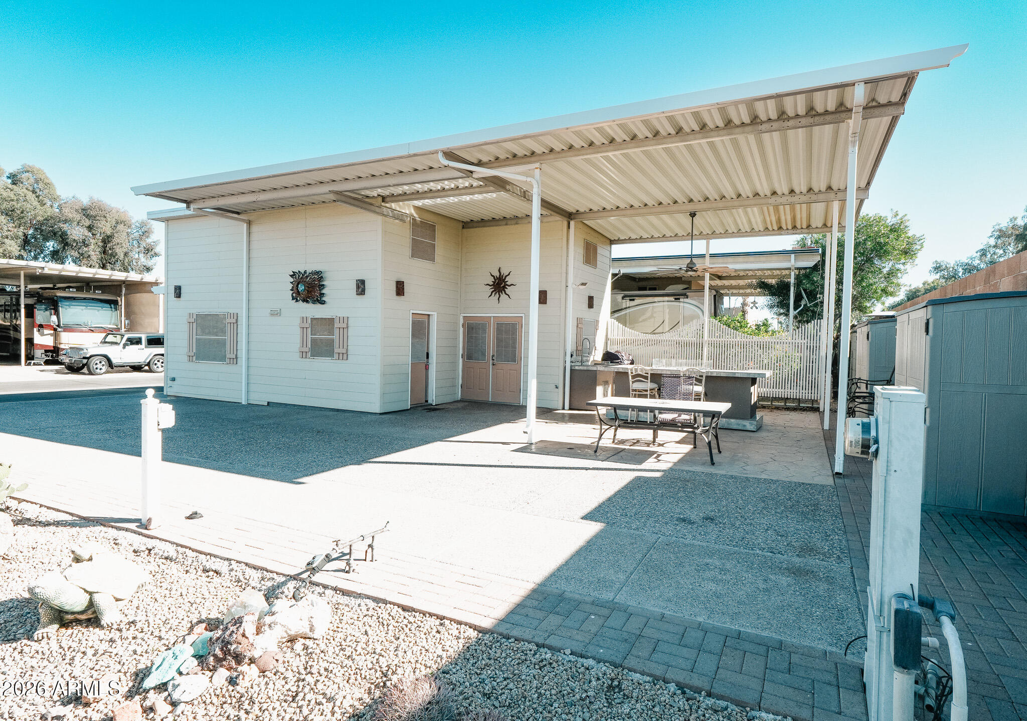 17200 West Bell Road, Unit 1806 Surprise, AZ 85374 - Photo 20 of 23 a view of a house with backyard