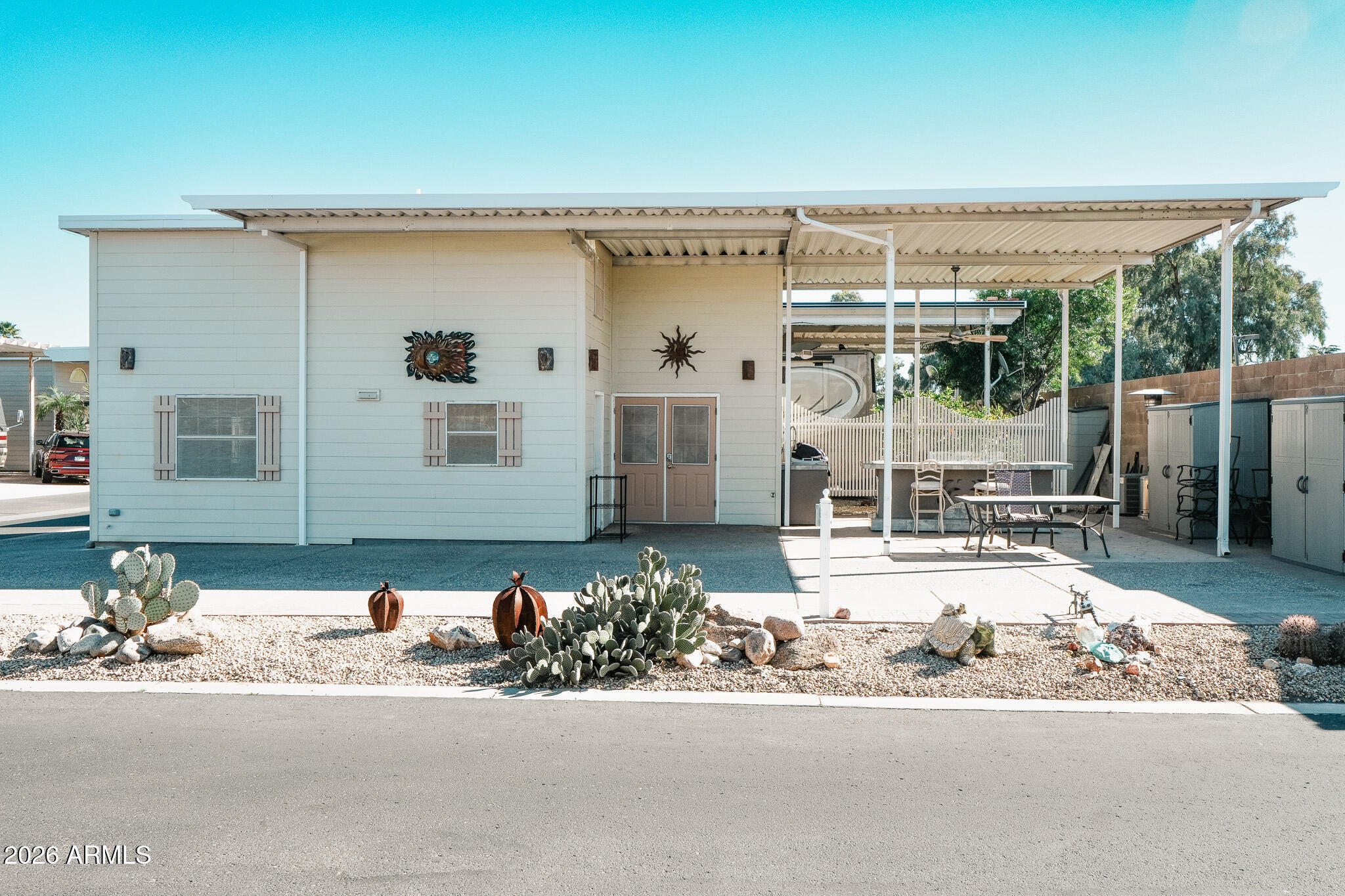 17200 West Bell Road, Unit 1806 Surprise, AZ 85374 - Photo 22 of 23 a view of a house with a outdoor space