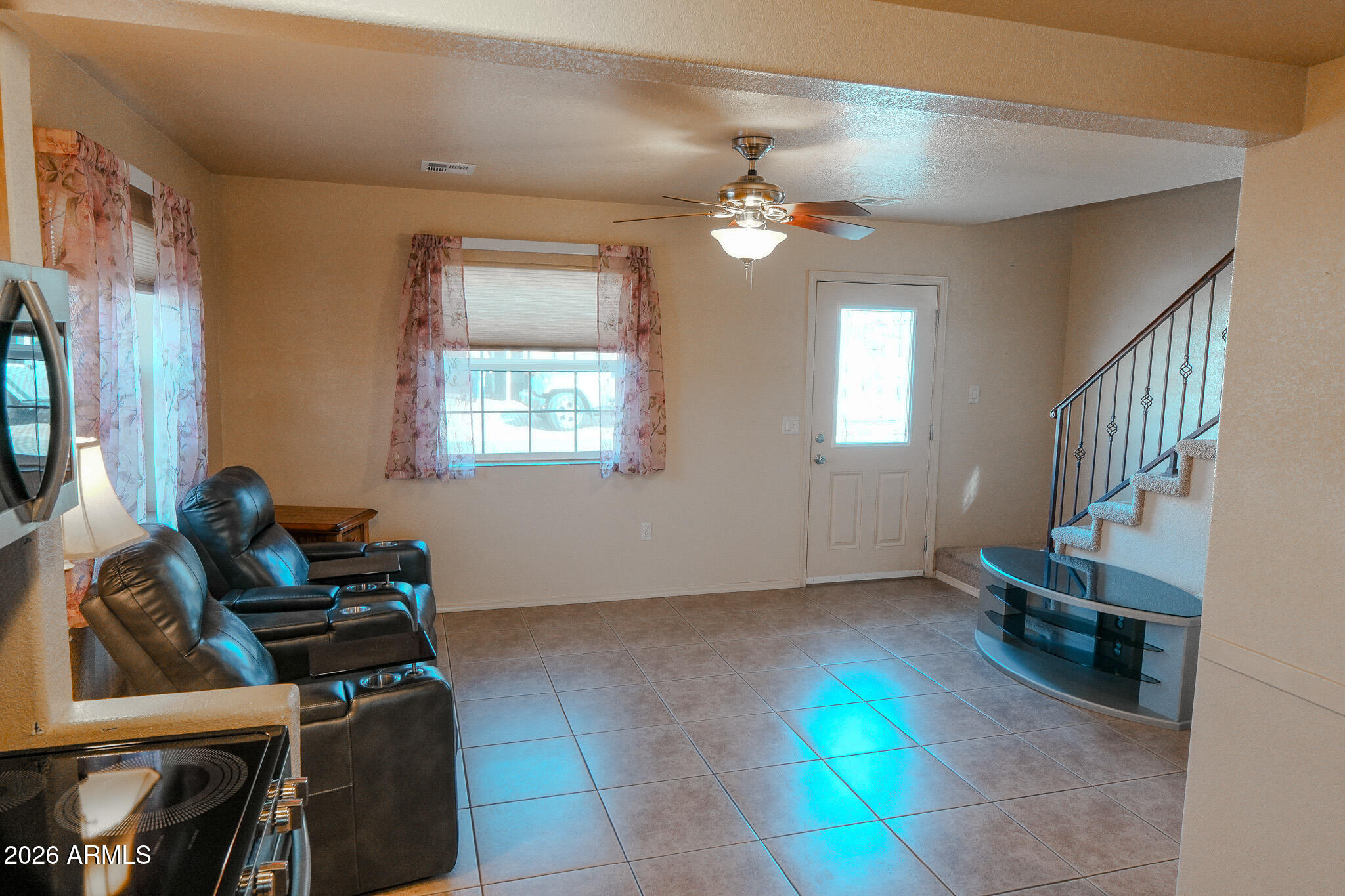 17200 West Bell Road, Unit 1806 Surprise, AZ 85374 - Photo 6 of 23 a view of a room with gym equipment