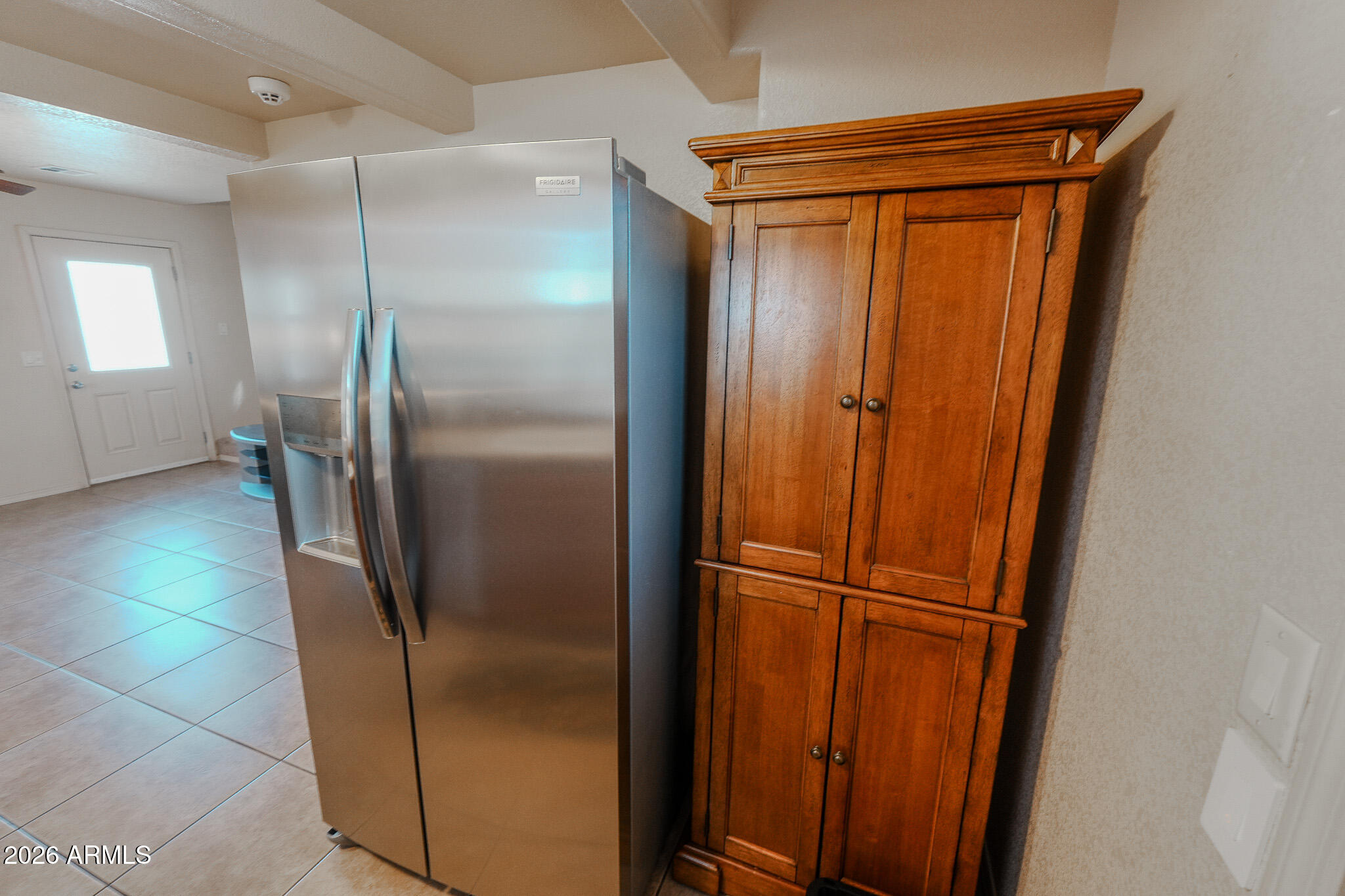 17200 West Bell Road, Unit 1806 Surprise, AZ 85374 - Photo 9 of 23 a view of refrigerator in kitchen