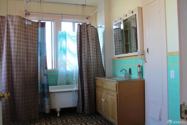 a room with window and shower