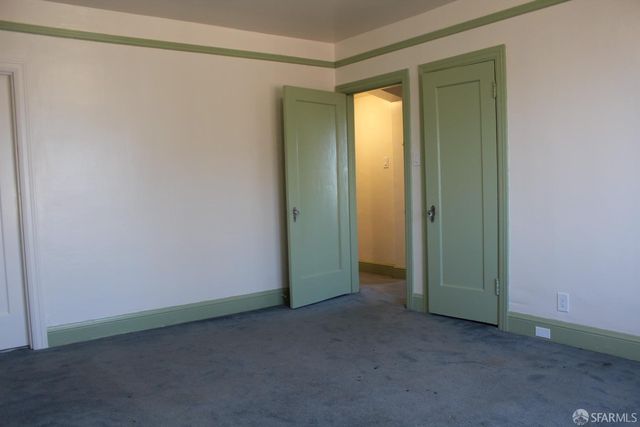 a view of a room that has a large window