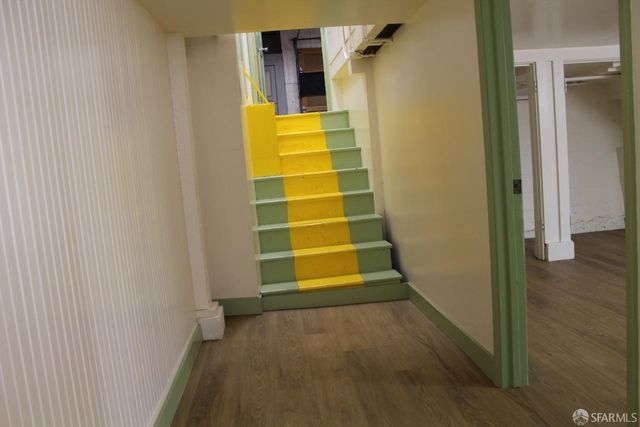 a view of front door and wooden door