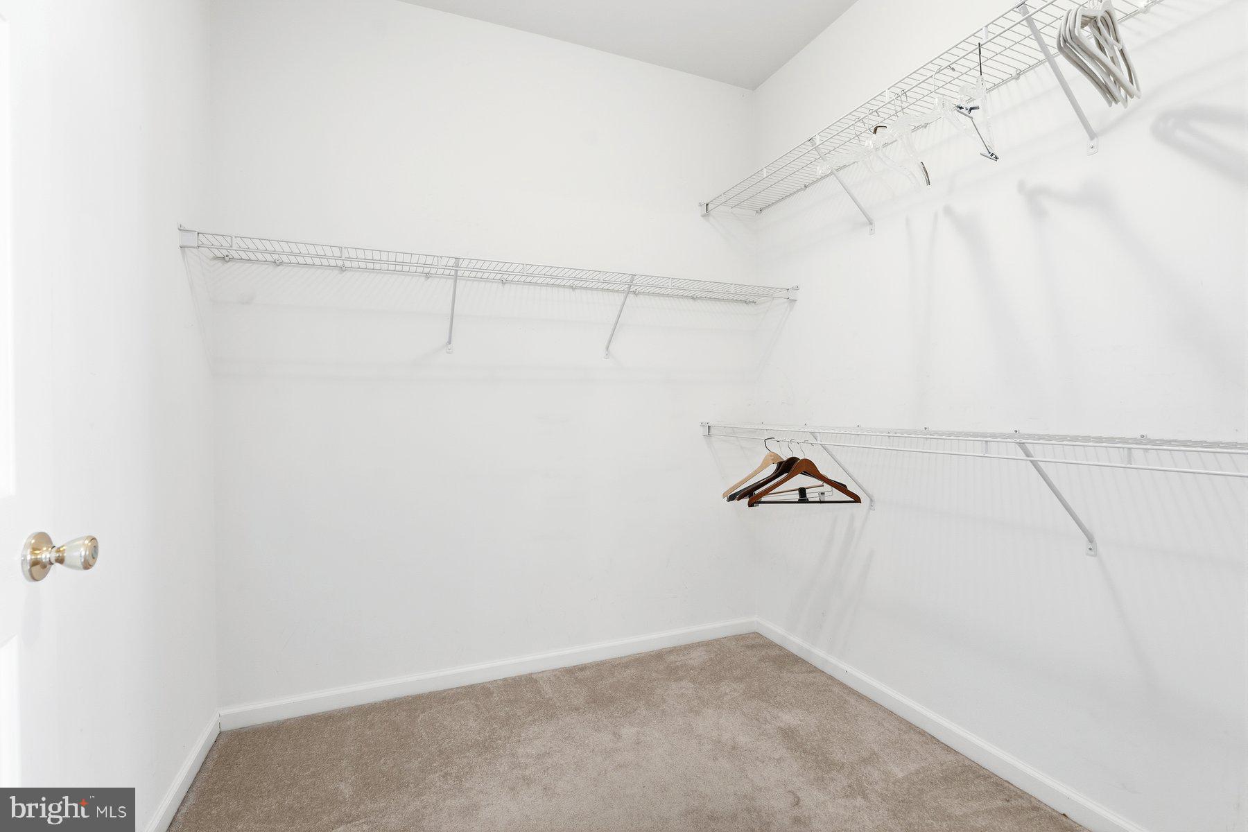 8330 Meadowsweet Road, Unit 8330 Pikesville, MD 21208 - Photo 18 of 55 a view of a rack on the wall