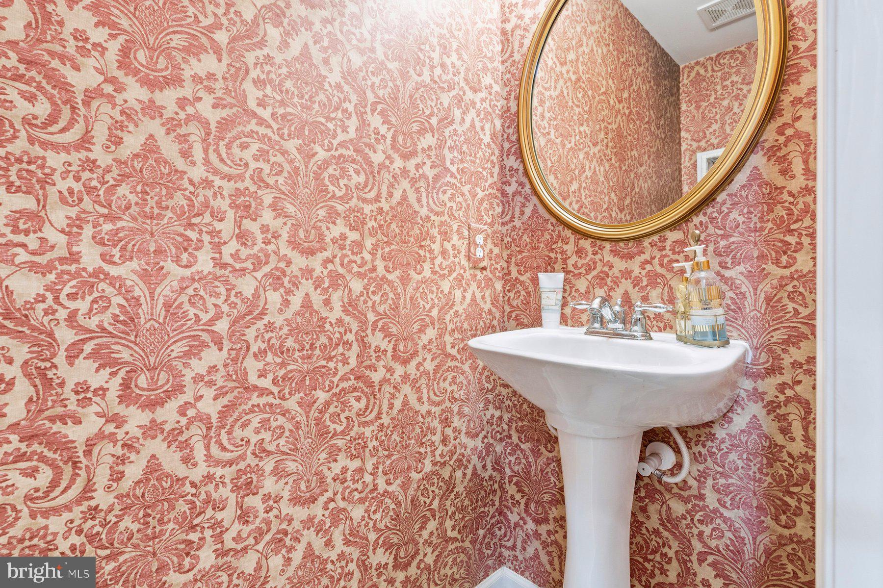 8330 Meadowsweet Road, Unit 8330 Pikesville, MD 21208 - Photo 21 of 55 a bathroom with a sink and a mirror