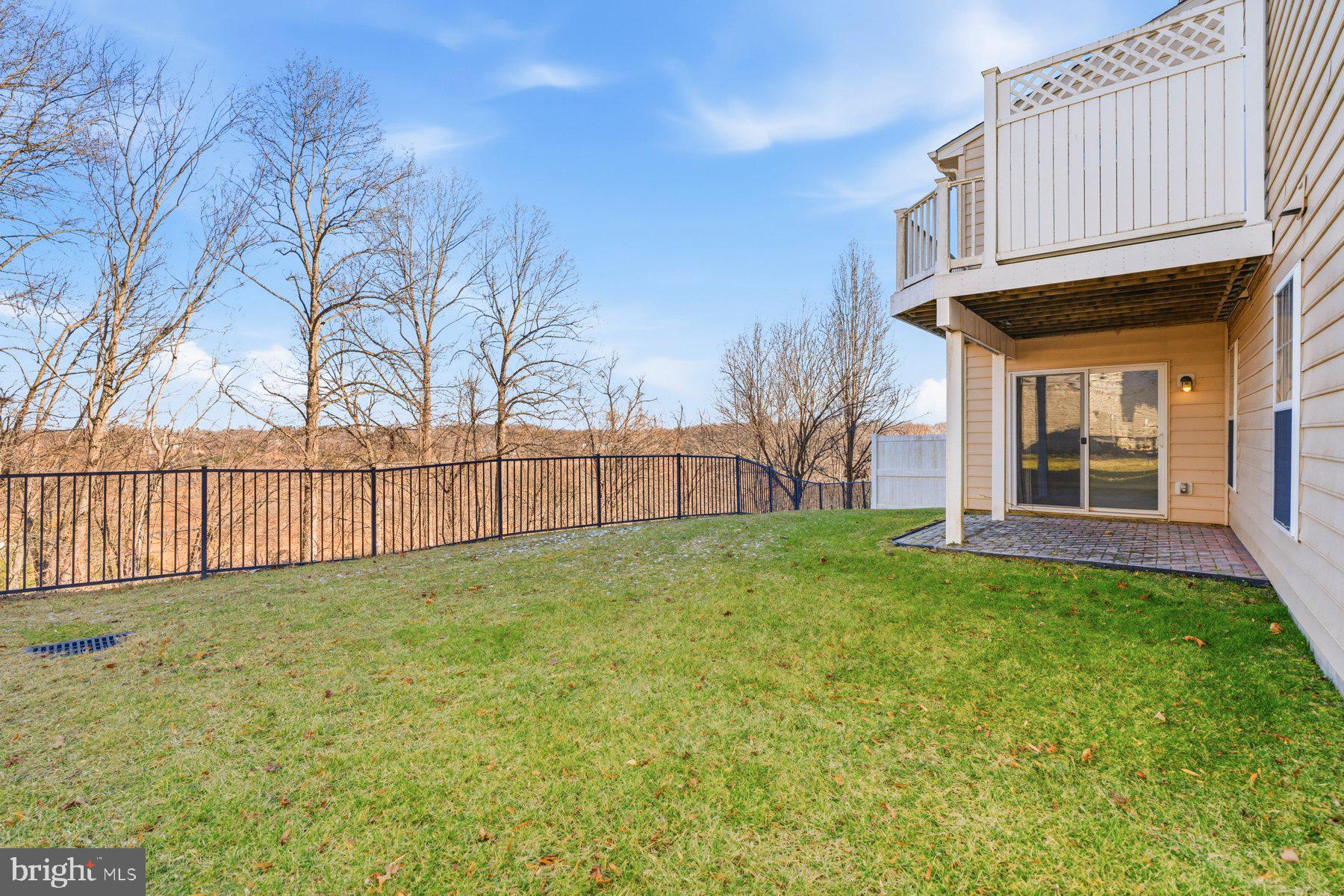 8330 Meadowsweet Road, Unit 8330 Pikesville, MD 21208 - Photo 40 of 55 a view of backyard with green space