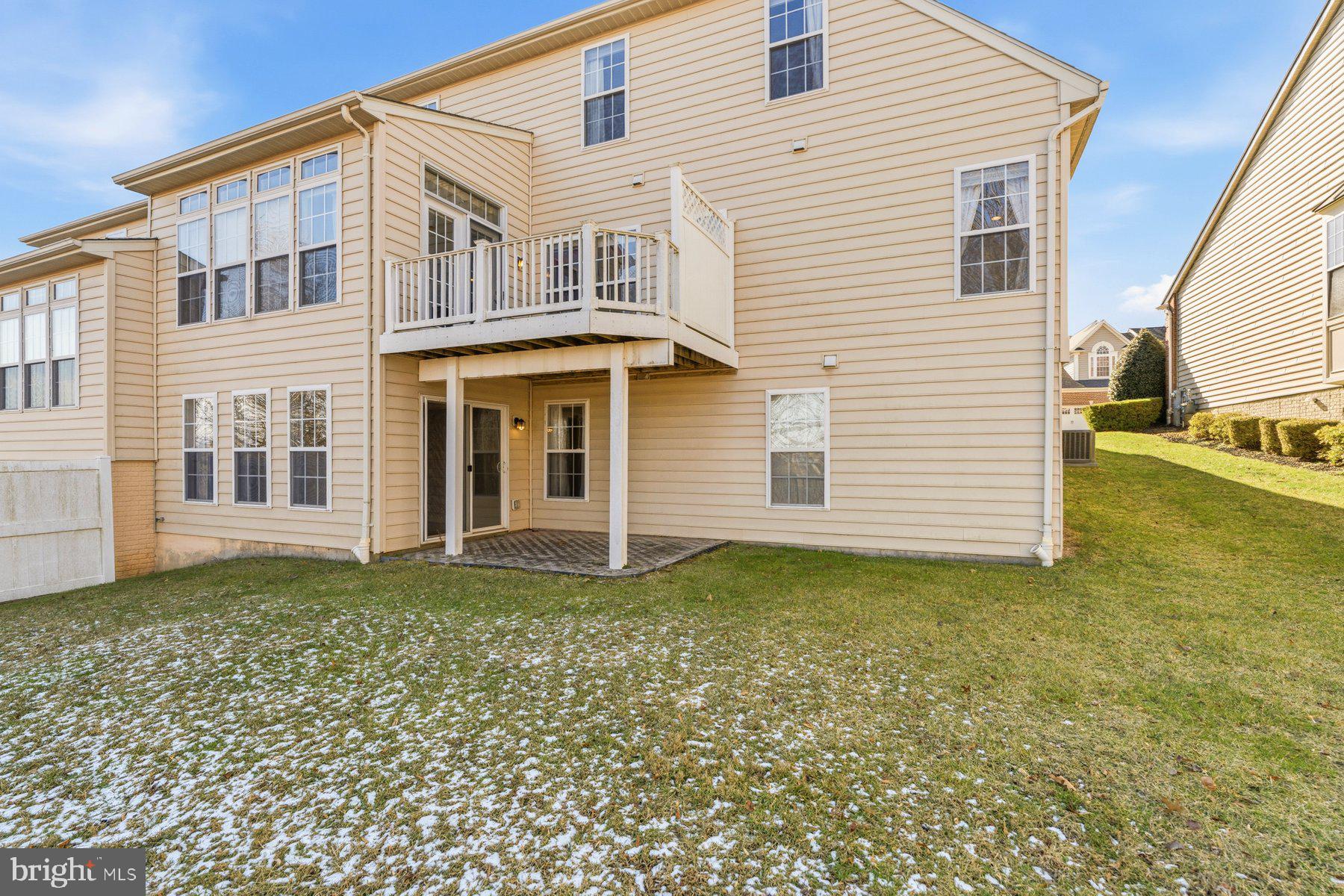 8330 Meadowsweet Road, Unit 8330 Pikesville, MD 21208 - Photo 42 of 55 a view of a house with a garden