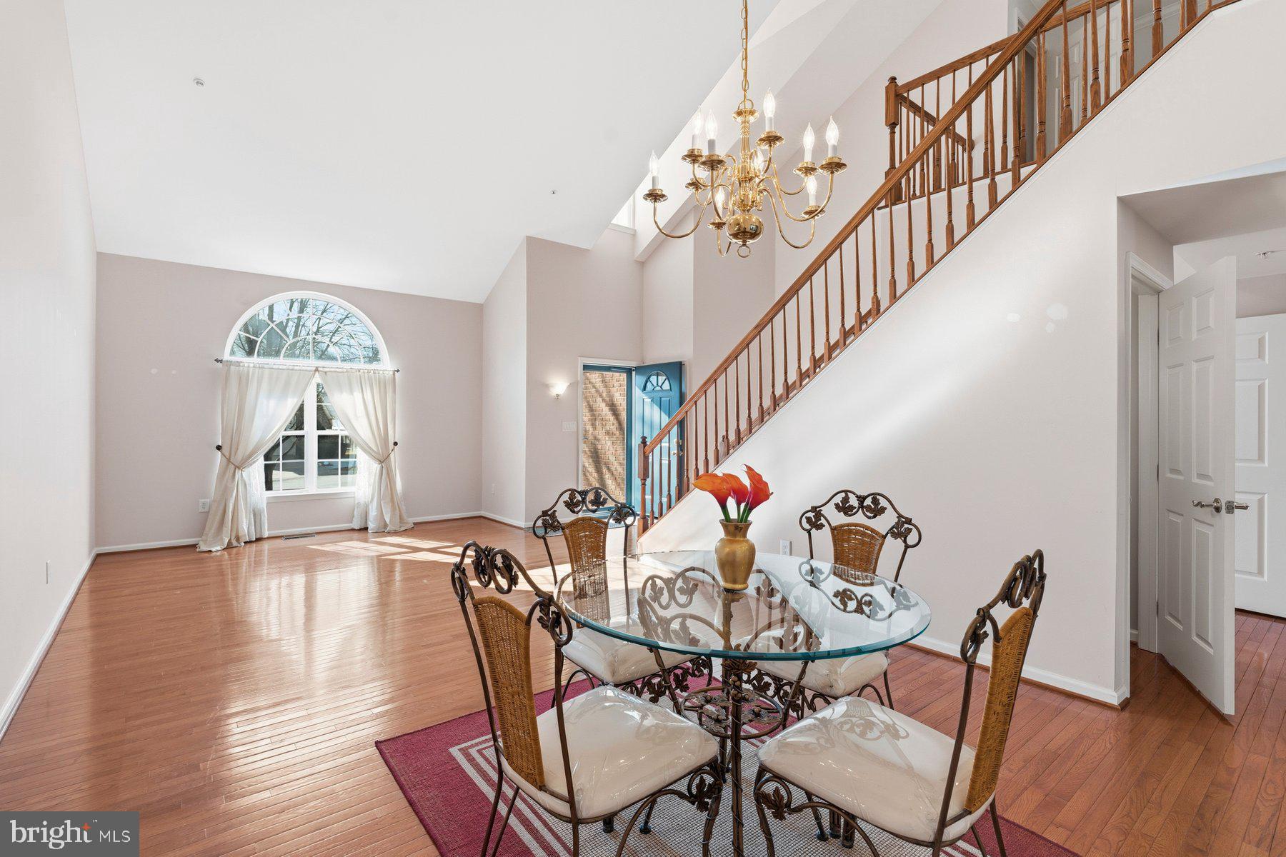 8330 Meadowsweet Road, Unit 8330 Pikesville, MD 21208 - Photo 54 of 55 a view of a dining room with furniture and wooden floor