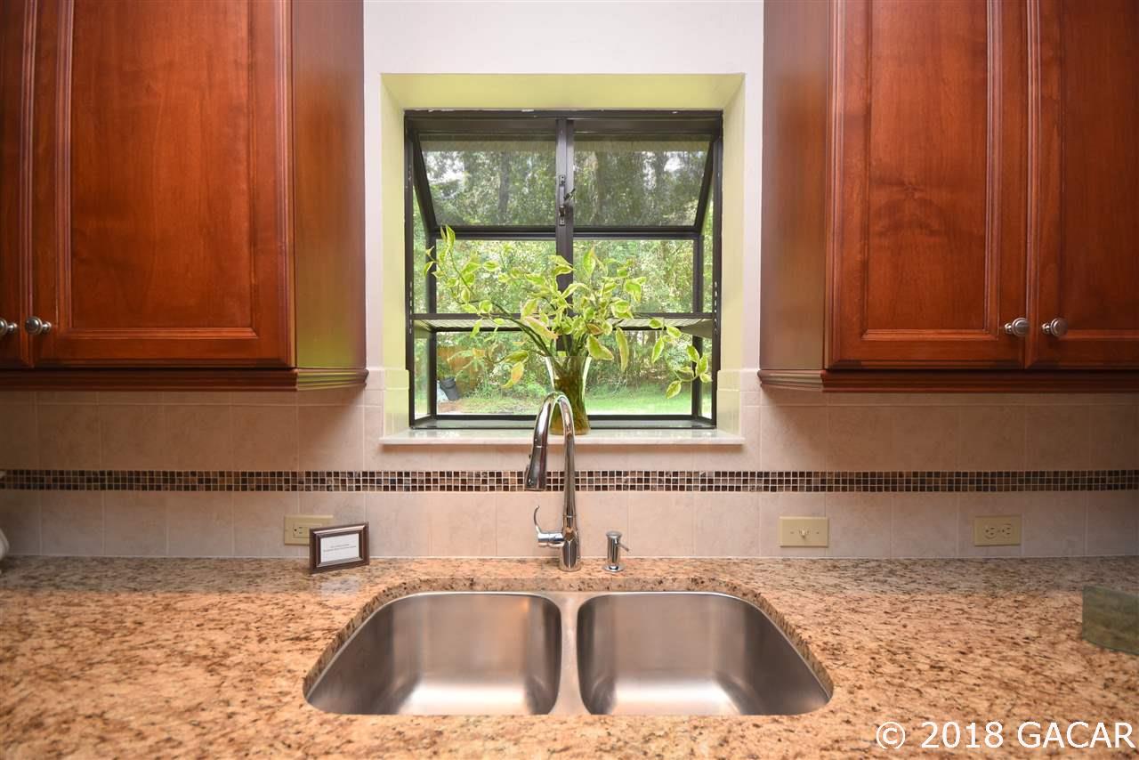9818 Southwest 1st Place Gainesville, FL 32607 - Photo 11 of 23 Kitchen Sink, looking Outdoors