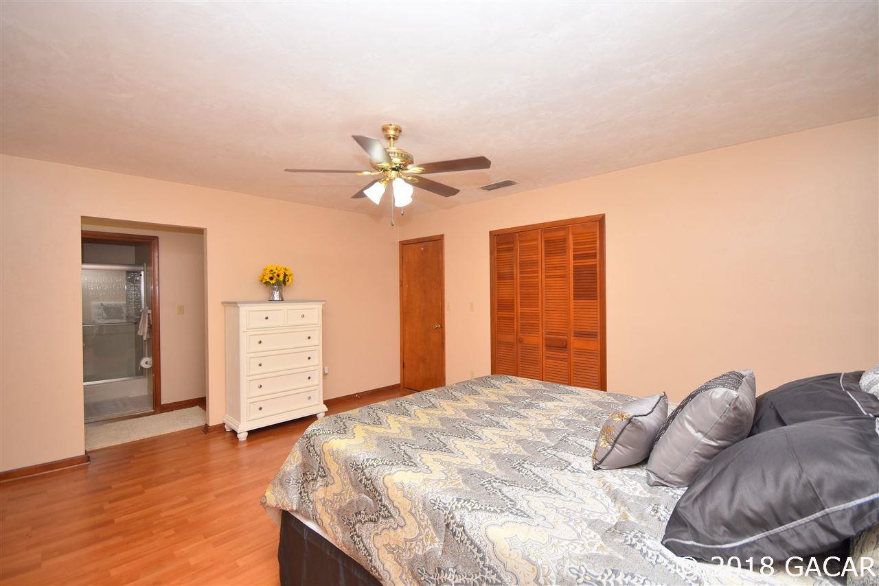 9818 Southwest 1st Place Gainesville, FL 32607 - Photo 14 of 23 Master Bedroom and Bath