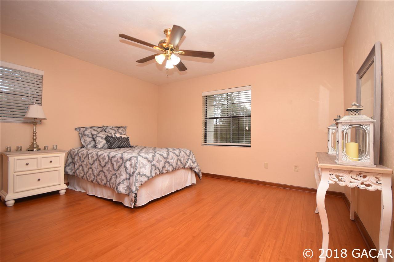 9818 Southwest 1st Place Gainesville, FL 32607 - Photo 16 of 23 Front Corner Bedroom