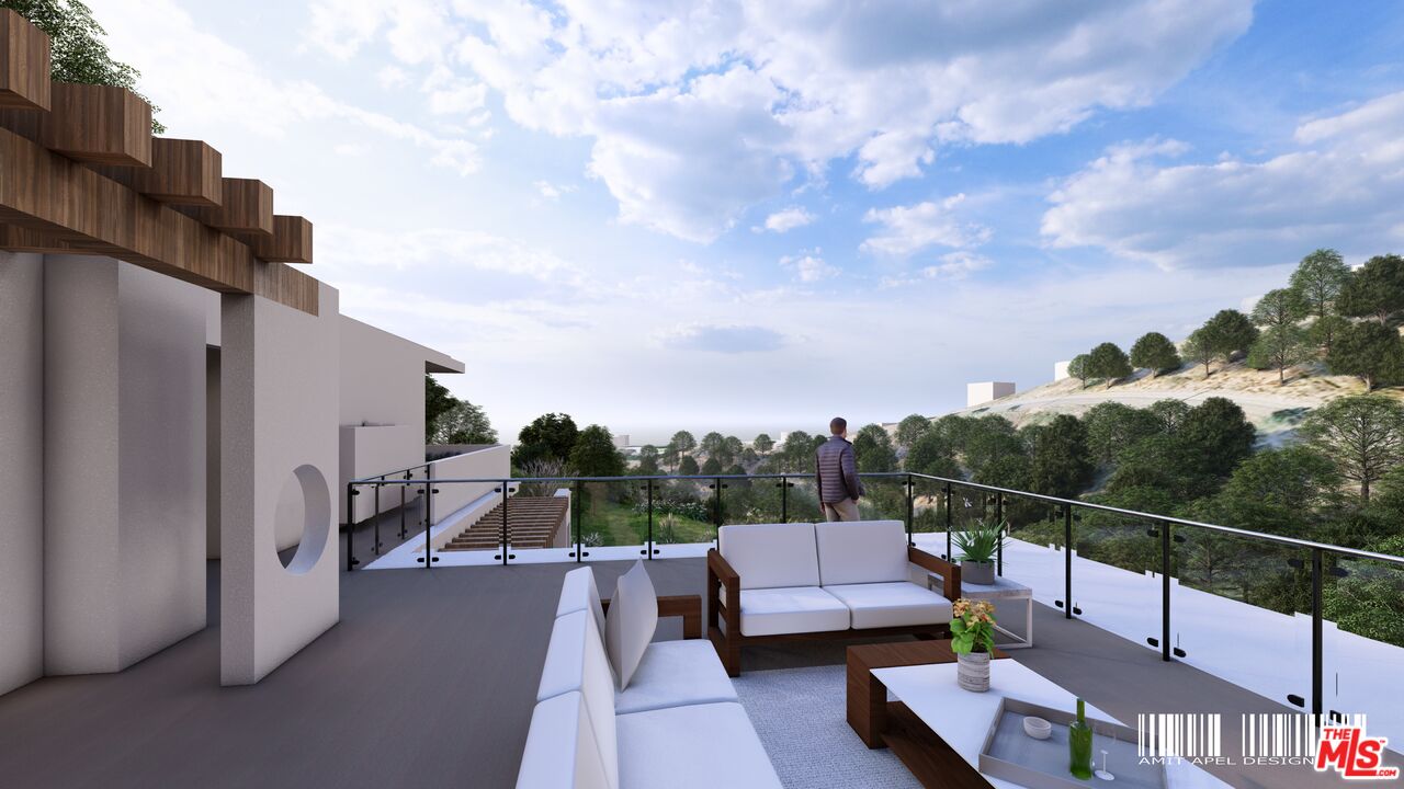 5801 Foxview Drive Malibu, CA 90265 - Photo 4 of 12 a view of a roof deck with couches and sky view