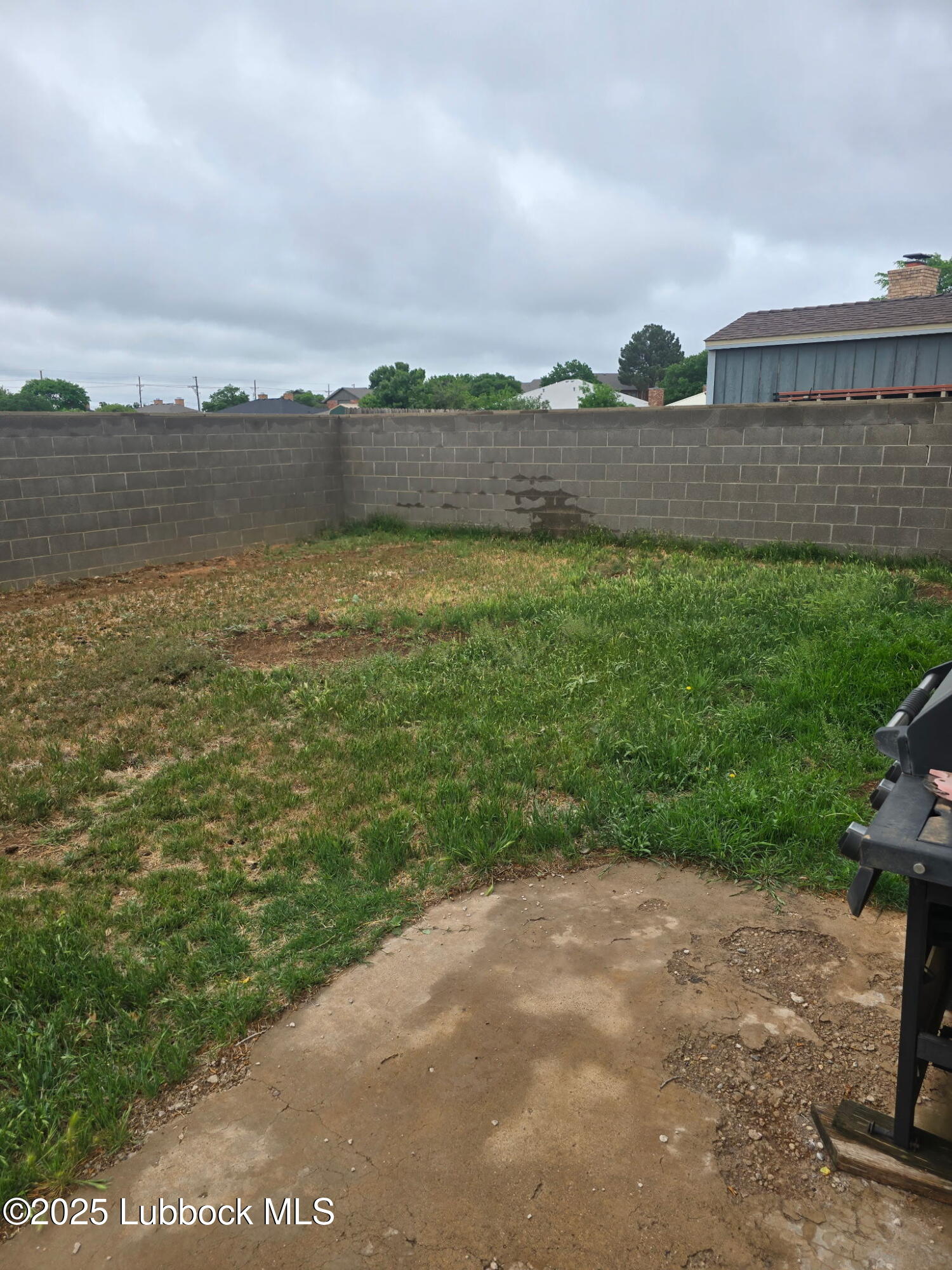 6004 68th Street Lubbock, TX 79424 - Photo 15 of 16 a view of a lake with a big yard