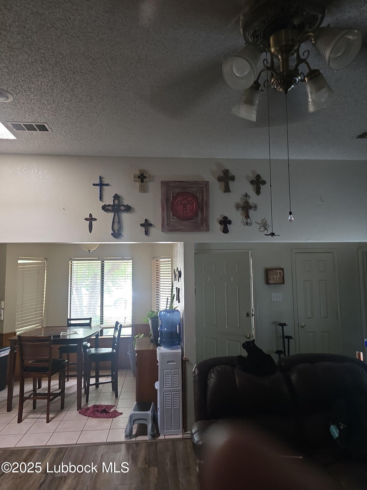 6004 68th Street Lubbock, TX 79424 - Photo 2 of 16 a living room with furniture and wooden floor