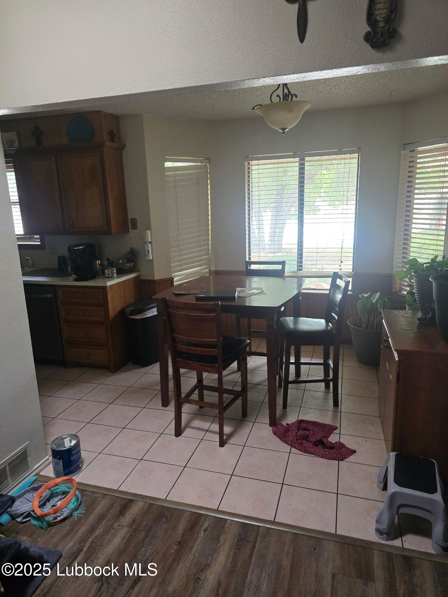 6004 68th Street Lubbock, TX 79424 - Photo 4 of 16 a view of a dining room with furniture