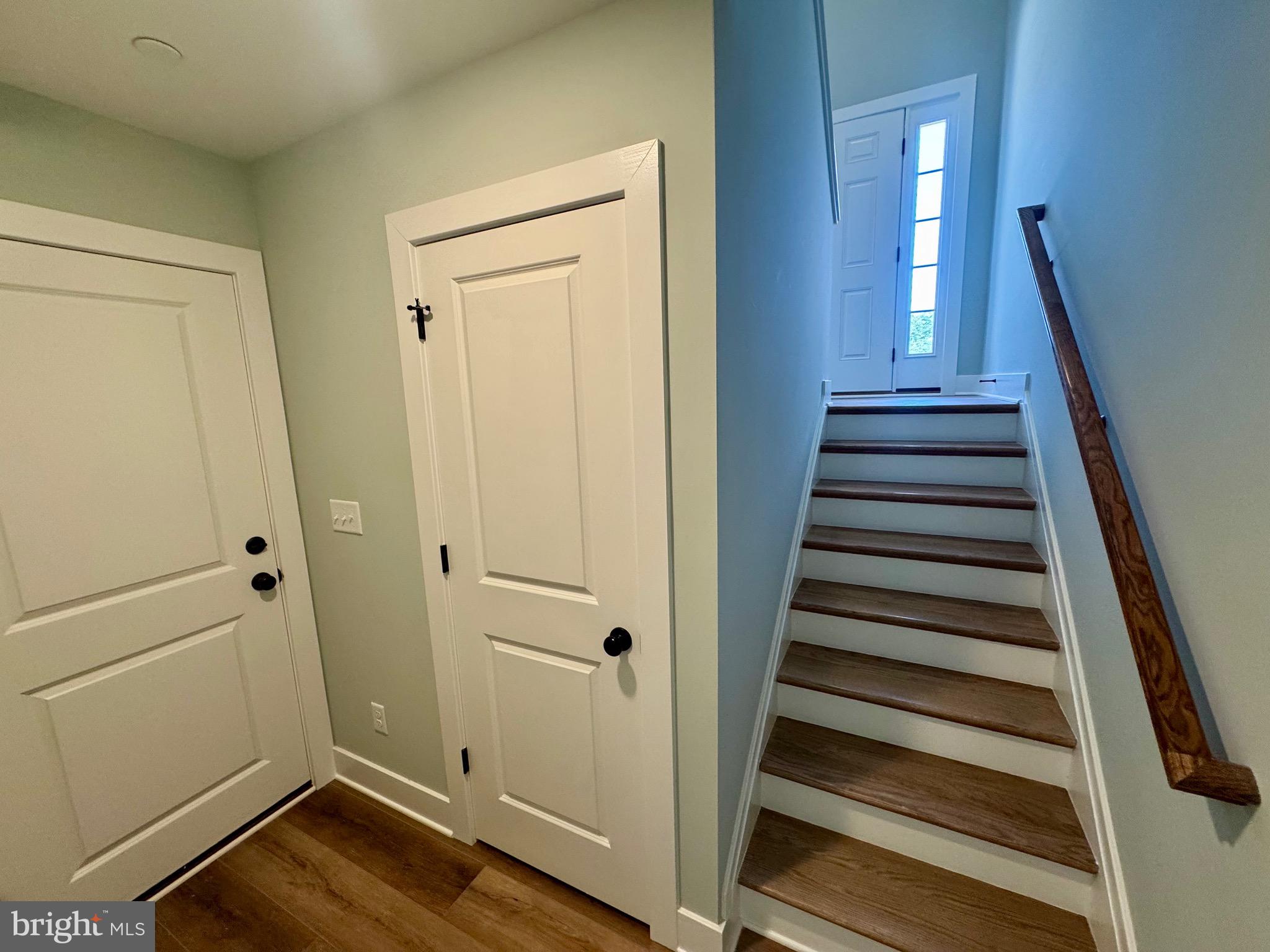 222 Long Point Road Stevensville, MD 21666 - Photo 28 of 44 a view of a hallway with wooden floor and entryway