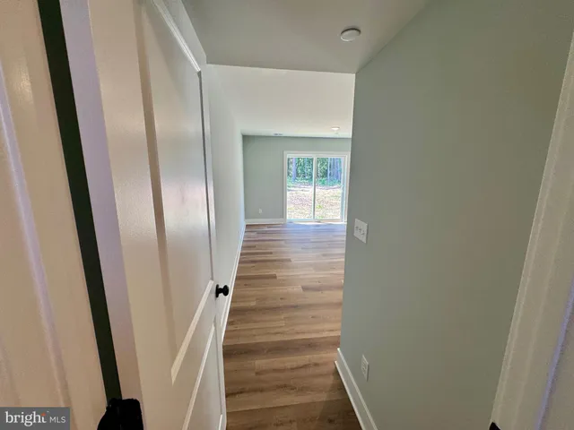 a view of a livingroom with wooden floor