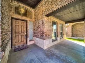 a view of front door with outdoor space