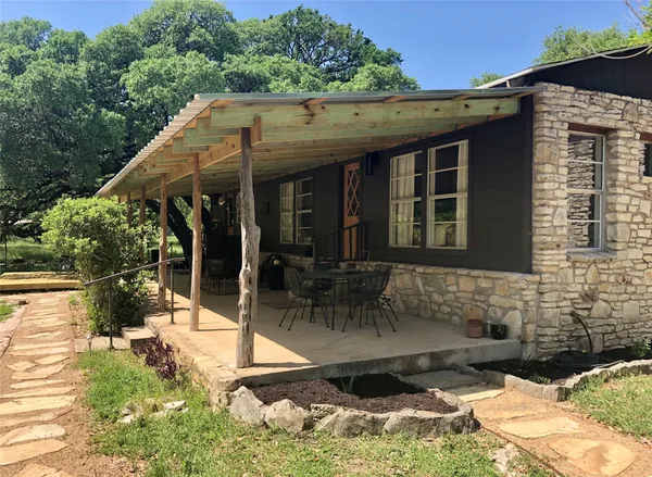 a view of a house with patio