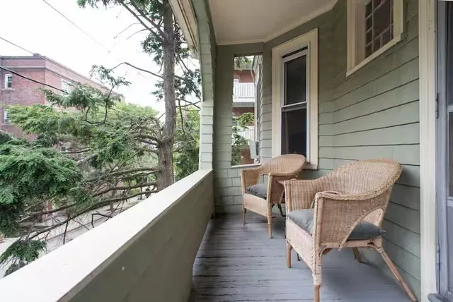 a view of a two chair in the balcony