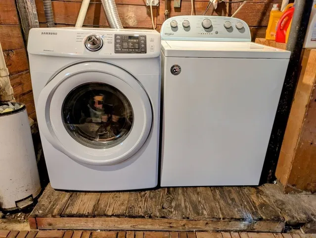 a utility room with dryer and washer