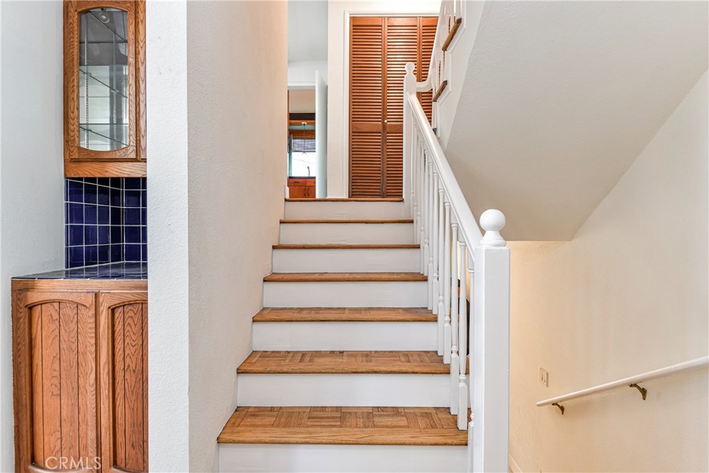 1141 17th Street, Unit 5 Santa Monica, CA 90403 - Photo 13 of 43 a view of staircase with white walls and windows