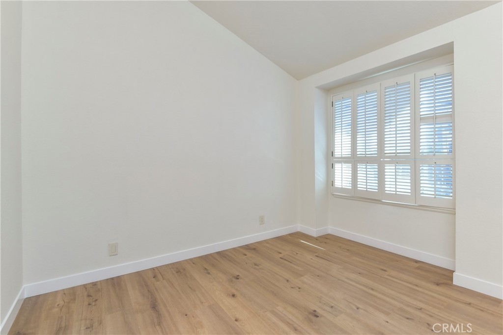 1141 17th Street, Unit 5 Santa Monica, CA 90403 - Photo 32 of 43 wooden floor in an empty room with a window