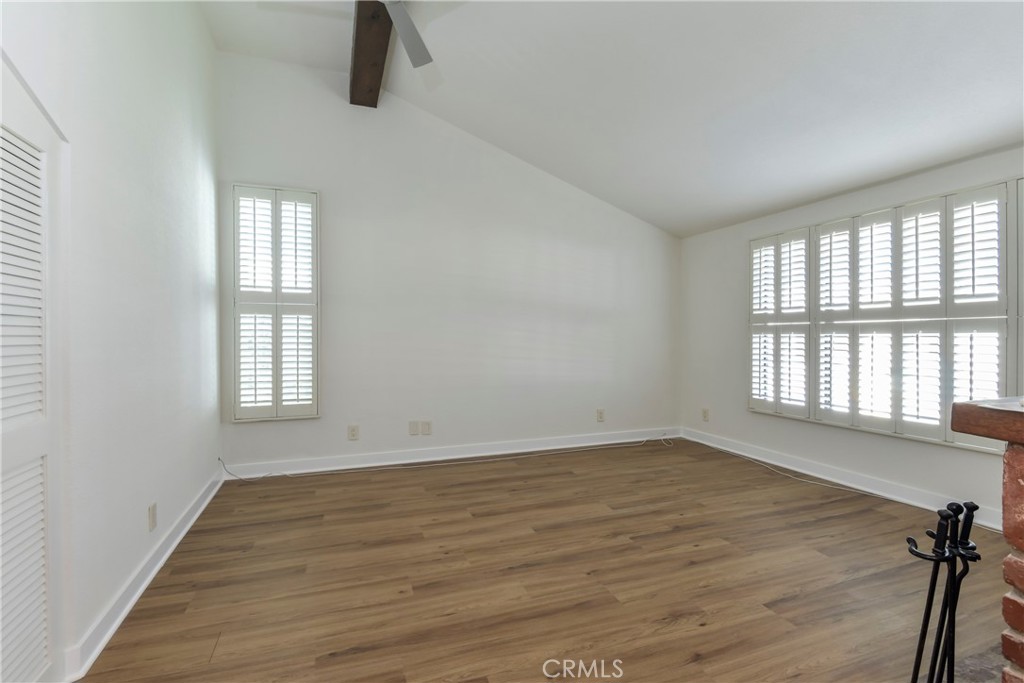 1141 17th Street, Unit 5 Santa Monica, CA 90403 - Photo 34 of 43 an empty room with wooden floor and windows
