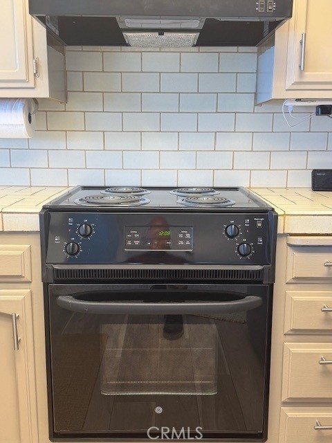 557 Lucerne Street Cayucos, CA 93430 - Photo 51 of 51 New stove/oven and hood