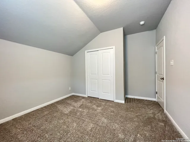 an empty room with an entryway