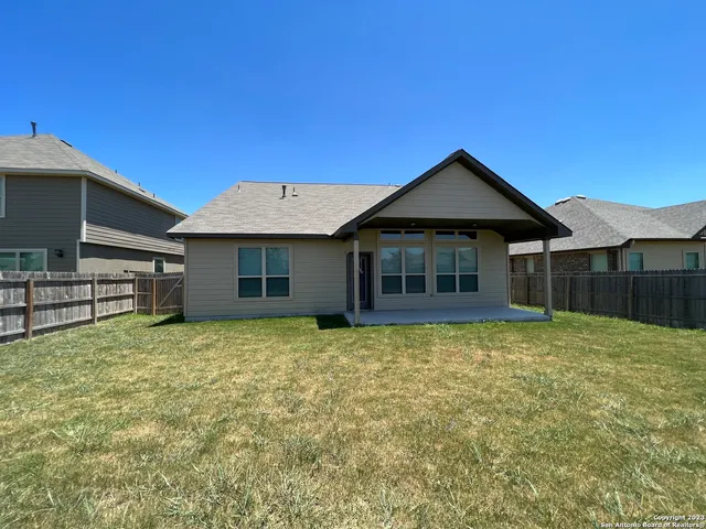 a backyard of a house with oven