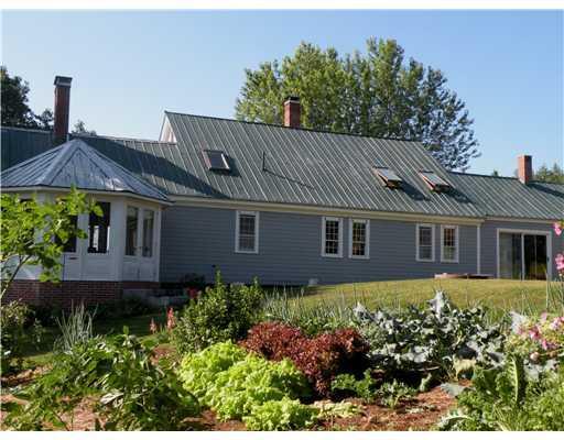 319 Brock School Road Buckfield, ME 04220 - Photo 5 of 19 Exterior Back. Rear of home with sun...