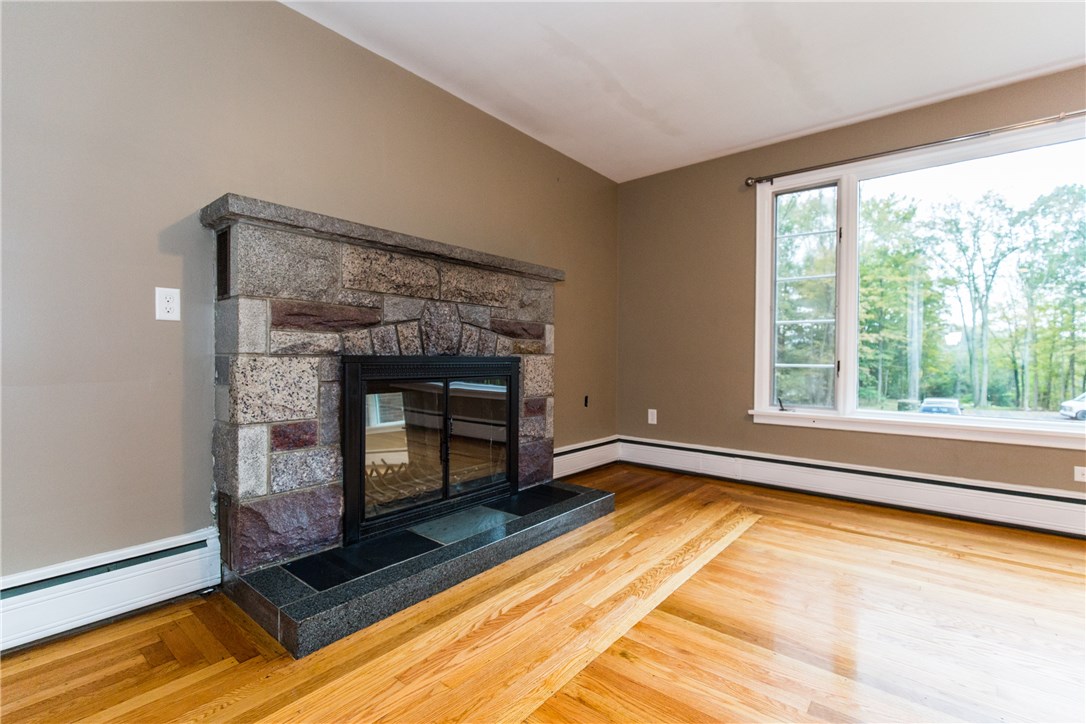 835 Great Road North Smithfield, RI 02896 - Photo 8 of 31 Living Room with gorgeous stone fireplace