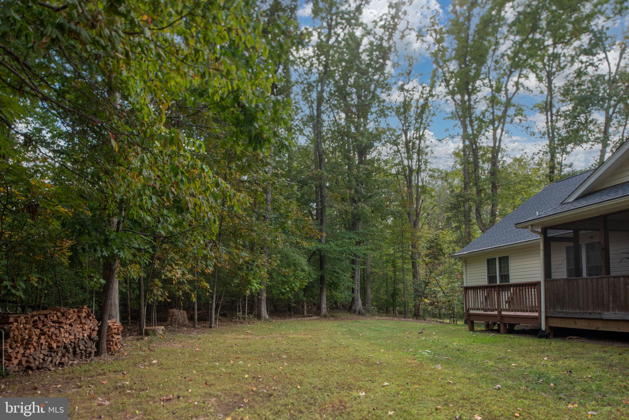 209 Edgemont Lane Locust Grove, VA 22508 - Photo 2 of 48 a view of a house with a yard