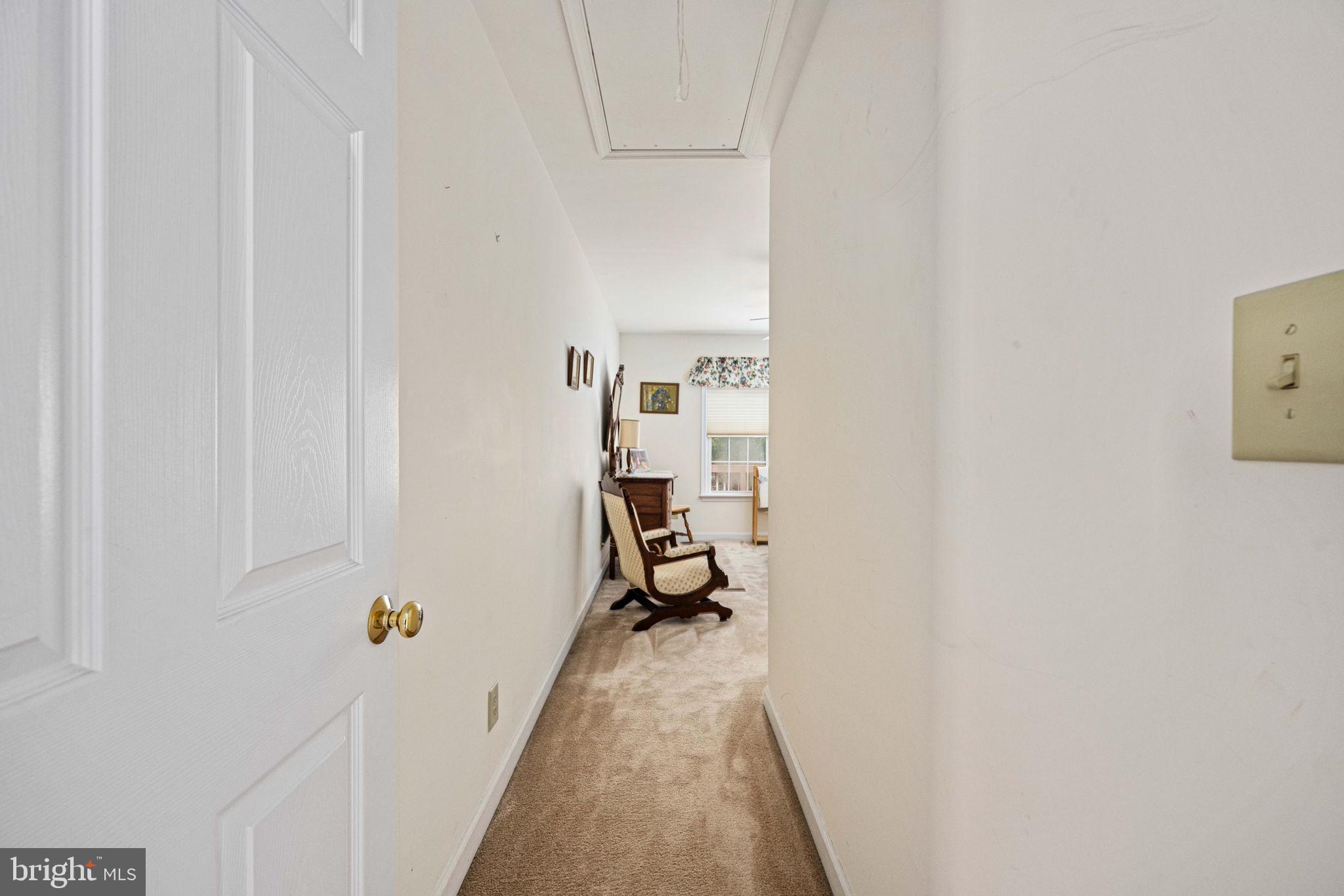 209 Edgemont Lane Locust Grove, VA 22508 - Photo 26 of 48 a view of a hallway with a couch