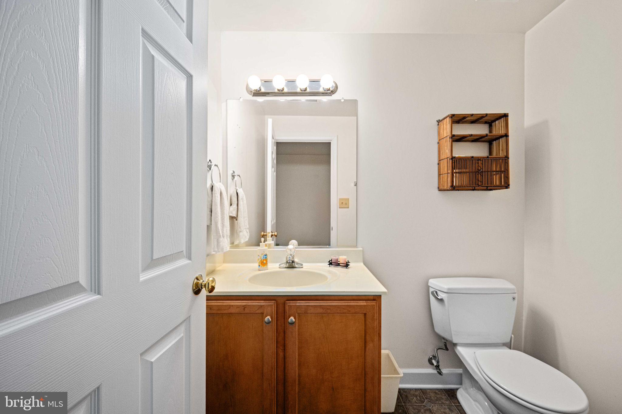 209 Edgemont Lane Locust Grove, VA 22508 - Photo 32 of 48 a bathroom with a toilet sink and mirror