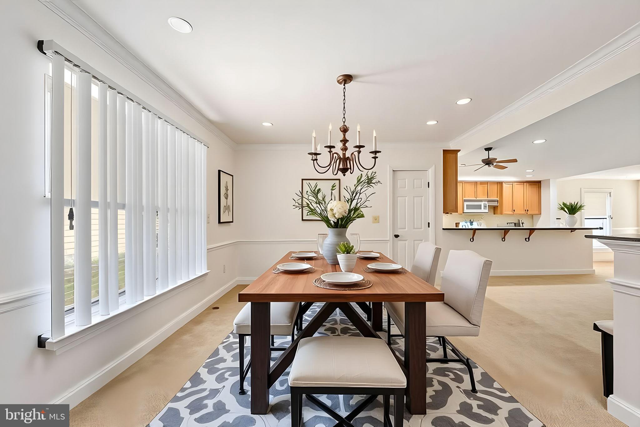 209 Edgemont Lane Locust Grove, VA 22508 - Photo 6 of 48 a view of a dining room with furniture and wooden floor
