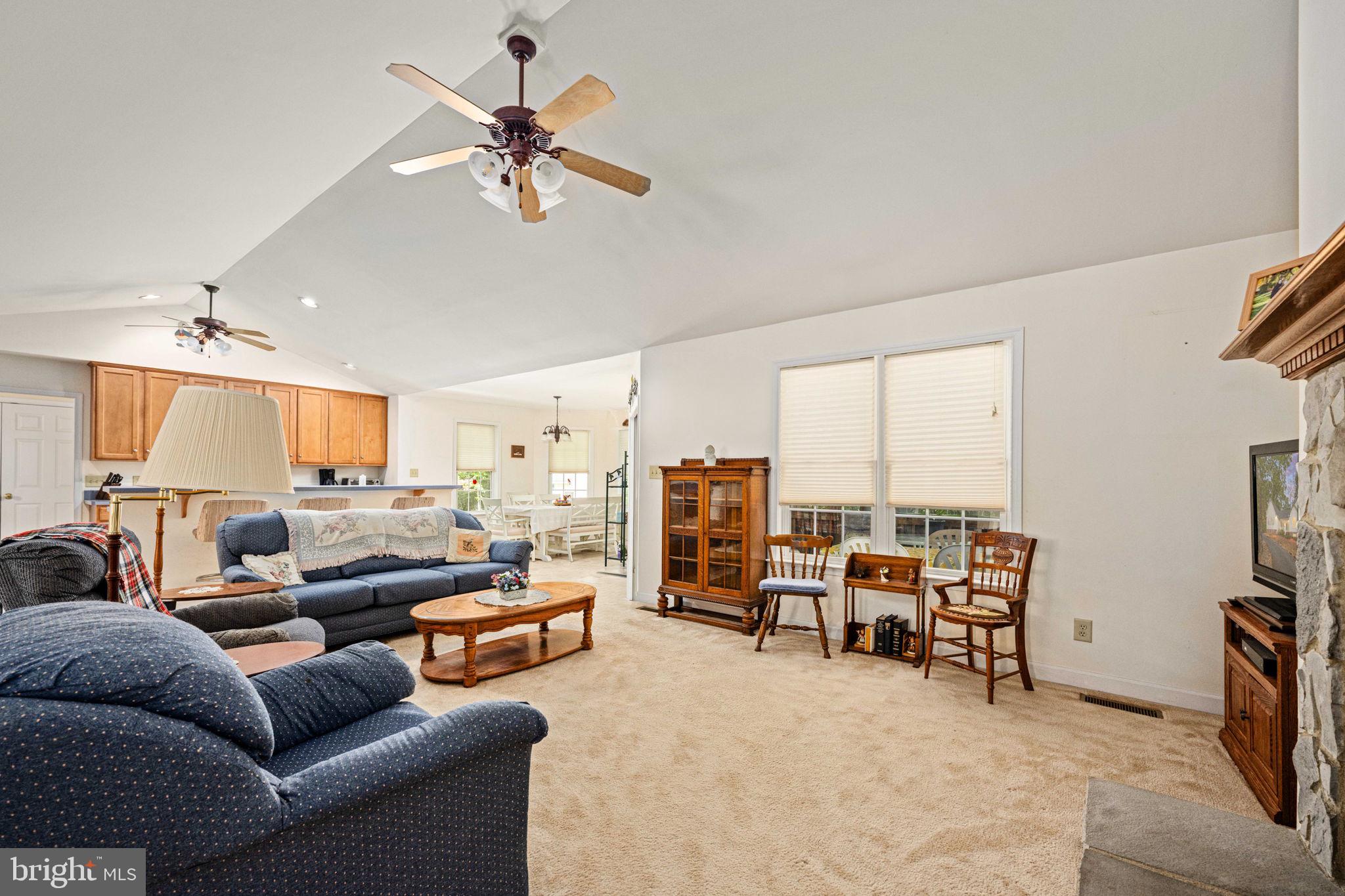 209 Edgemont Lane Locust Grove, VA 22508 - Photo 10 of 48 a living room with furniture kitchen view and a large window