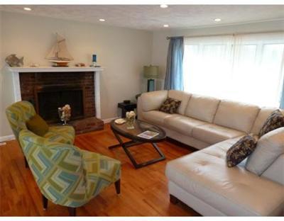 2 Quamhassett Road Buzzards Bay, MA 02532 - Photo 4 of 12 a living room with furniture and a fireplace