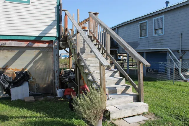 a front view of a house with garage
