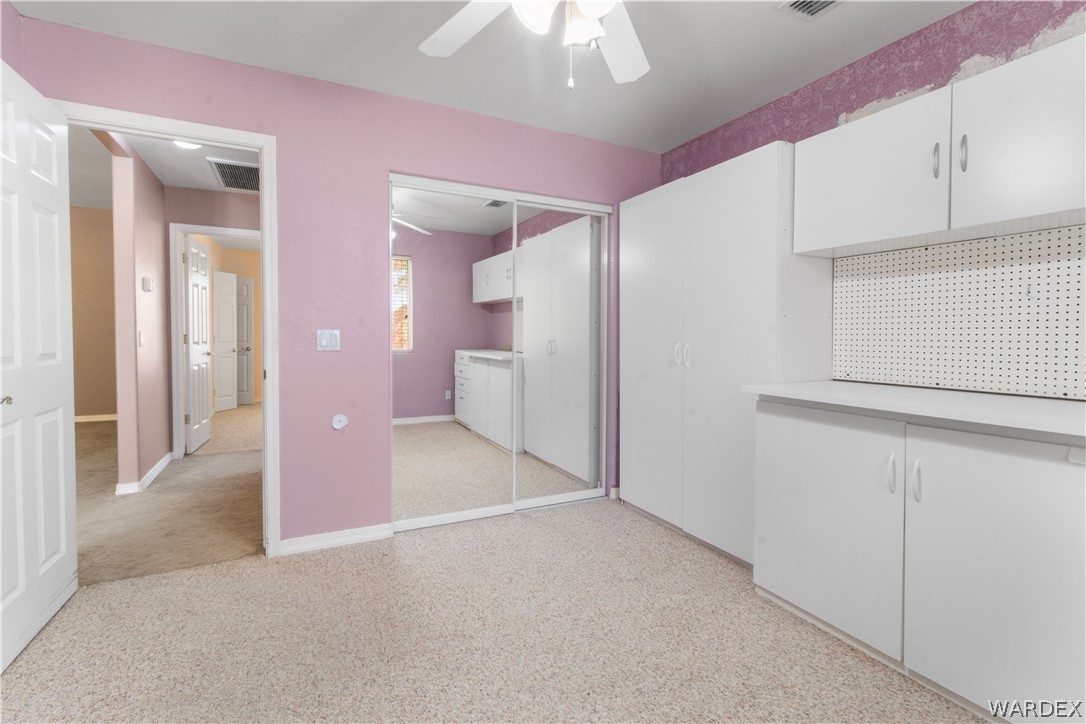 2158 Ranch Road Kingman, AZ 86401 - Photo 18 of 48 wooden floor in an empty room