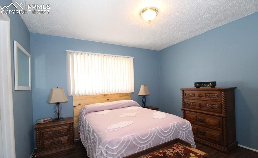 210 4th Street Fowler, CO 81039 - Photo 11 of 18 a bedroom with a bed and a closet