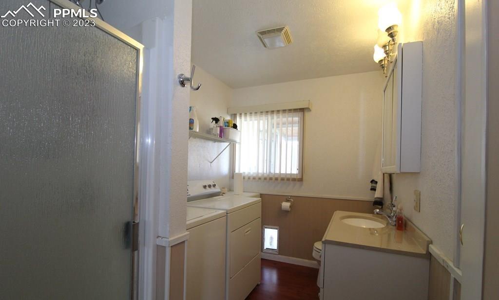 210 4th Street Fowler, CO 81039 - Photo 13 of 18 a bathroom with a sink toilet and window