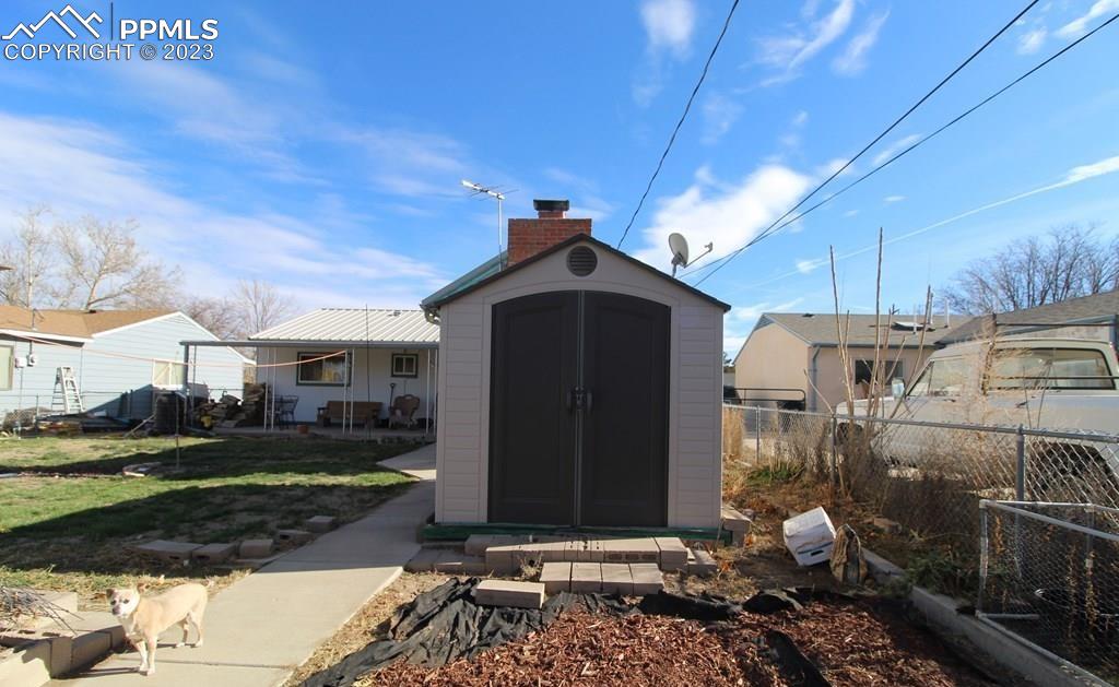 210 4th Street Fowler, CO 81039 - Photo 17 of 18 a front view of a house with a yard