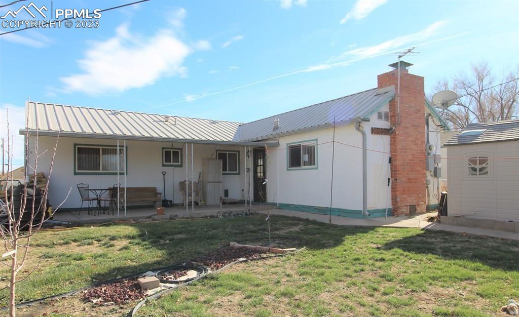 210 4th Street Fowler, CO 81039 - Photo 18 of 18 a view of a house with backyard and porch