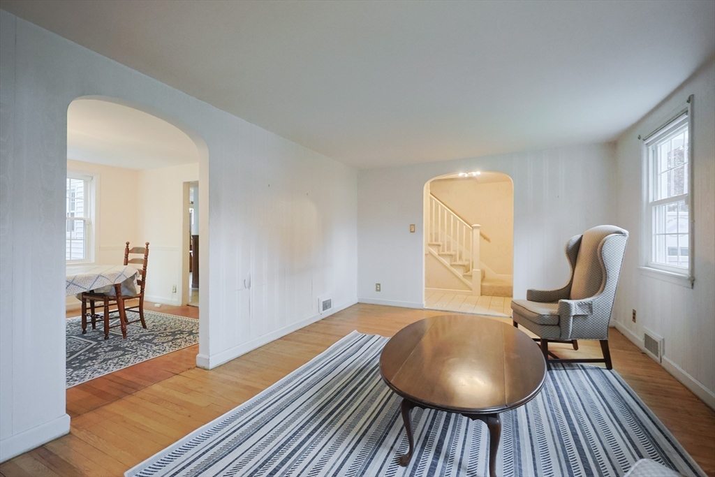17 Sagamore Road Belmont, MA 02478 - Photo 11 of 35 a view of a room with wooden floor lounge chair and windows