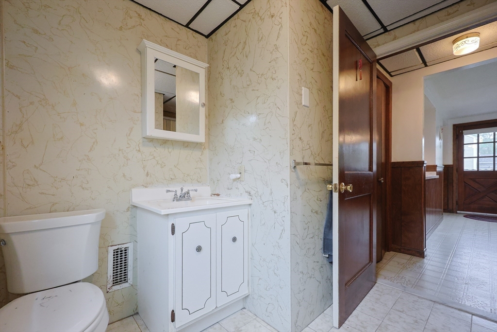 17 Sagamore Road Belmont, MA 02478 - Photo 14 of 35 a bathroom with a toilet sink and mirror