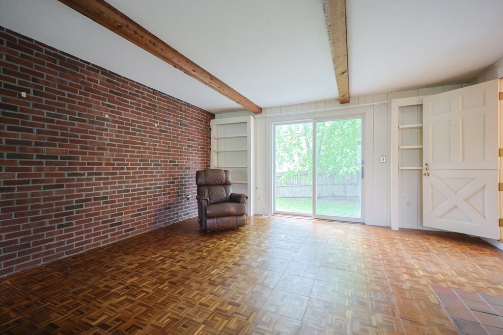 17 Sagamore Road Belmont, MA 02478 - Photo 17 of 35 a view of a livingroom with furniture and staircase