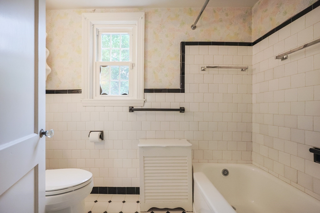 17 Sagamore Road Belmont, MA 02478 - Photo 27 of 35 a bathroom with a sink a toilet and a bathtub
